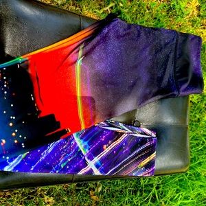 Onzie brand leggings, size xs, stars, and skyline print.